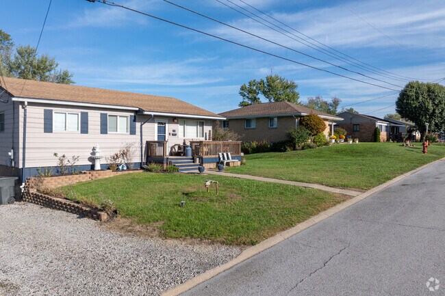 Many homes feature lawns with seasonal decor.