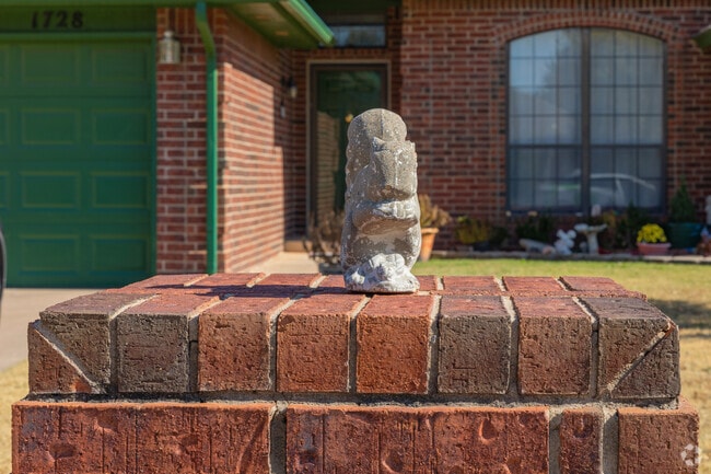Some mailboxes and homes in Covell-Danforth have unique features .