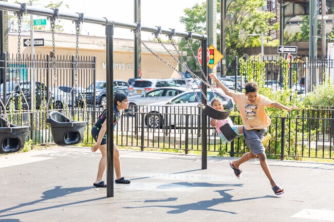 Ozone Park residents have lots of fun at Police Officer Nicholas Demutiis Playground.