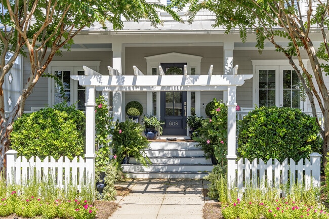 A beautiful front porch in Eastwind-Piney Acres basks in the sun.