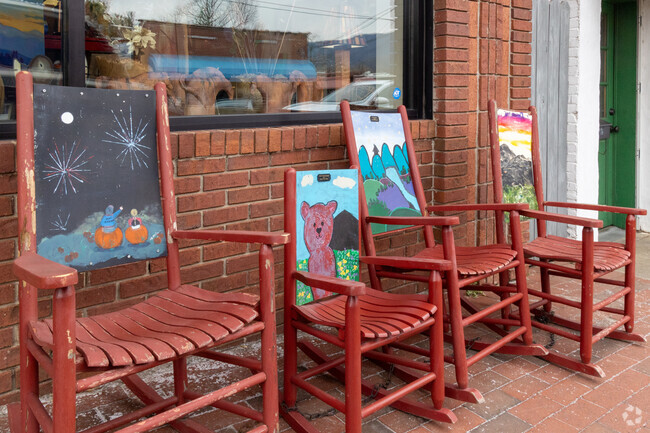Red chairs painted by local artists, students, and others are on display all over Black Mountain.