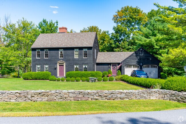 Colonial homes in Greenville Town start around $470,000 and offer spacious lawns.