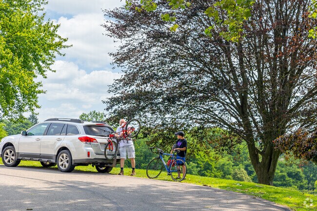 Unpack the bikes and hit the trails 1 mile from Summer Hill at Riverview Park.