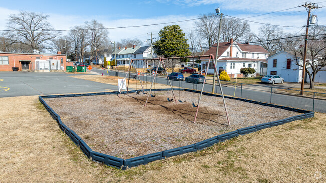 Students enjoy this classic swing set at Badin Elementary School during recess.