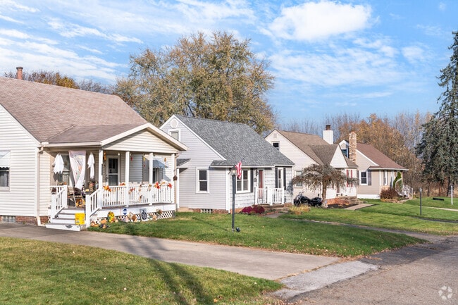 Many homes in Plain Township gable roofs and open front yards.