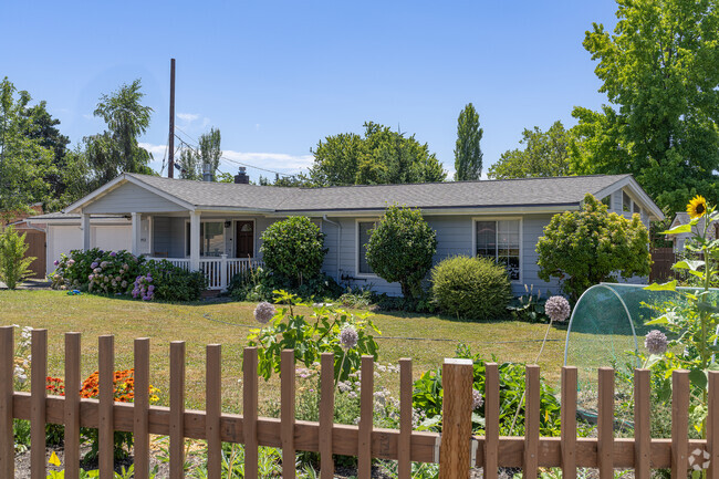 A front yard garden adorns this ranch style home in Oak Creek.
