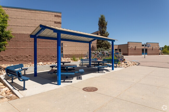 On a bright sunny day, the kids can stay out of the sun at Aurora Frontier K-8.