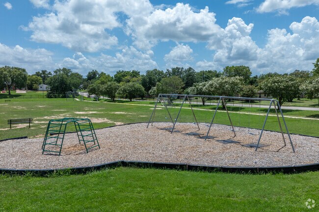 Students create carefree moments on the swings at Neal Elementary School.