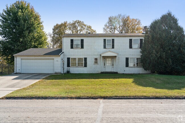 This classic Colonial-style home adds timeless charm to the Folwell Drive neighborhood.