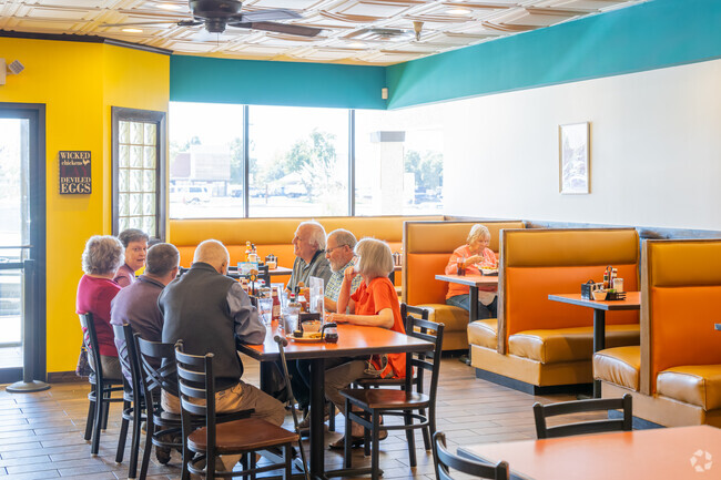 Near Swan Lake, Yolkizz Cafe serves American-style brunch for the local community.
