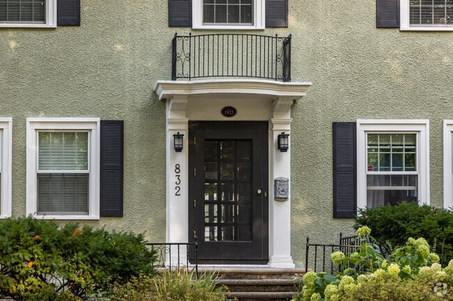 The historic nature of Astor homes is evident with dated plaques.