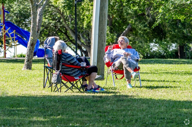 Taylor Lake Village offers expansive areas of green space, great for spending time with friends.