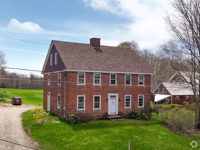 This historic red-brick Colonial is nestled in Limington.