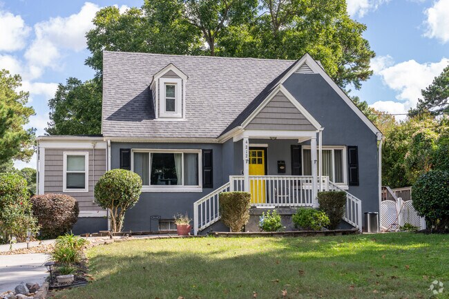 A contemporary painted cape cod in the Midtown Portsmouth neighborhood of Portsmouth, Virginia.