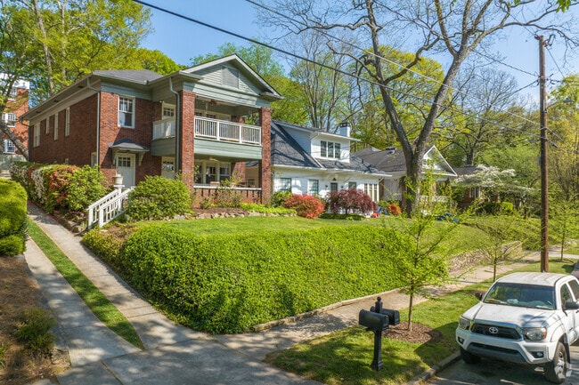 Virginia Highland features a variety of architectural style homes with lush green front lawns.