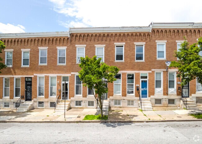 Many homes in Berea have simple brick facades and short front stoops.