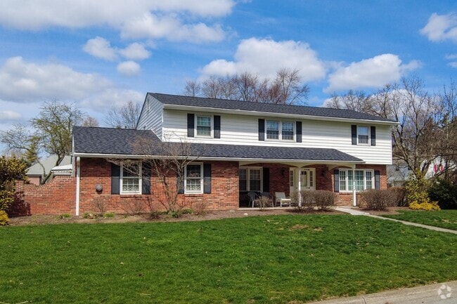 A lovely two story capturing the mid-century style home.