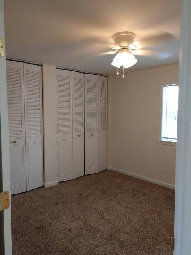 Double Floor to Ceiling Closets in Bedroom