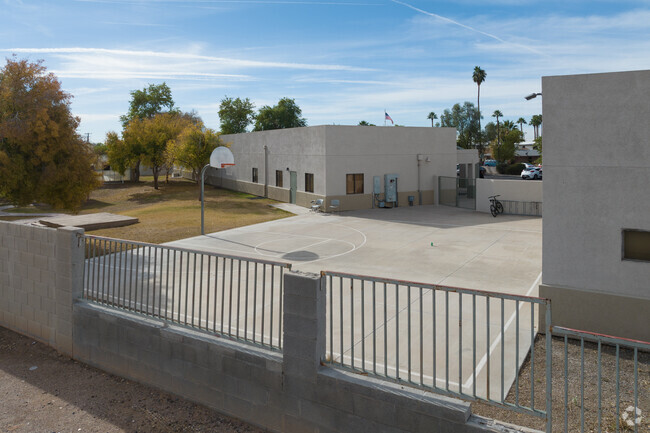 Academy with Community Partners in Mesa includes a small basketball court for its students.
