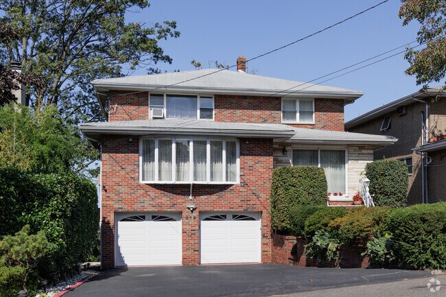 Brick four square style houses can also be found in Palisades Park, NJ.