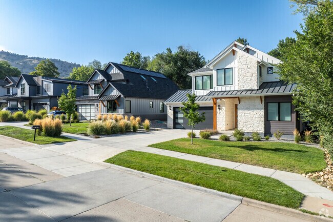 Many Wonderland homes come with manicured lawns and driveways that lead to attached garages.