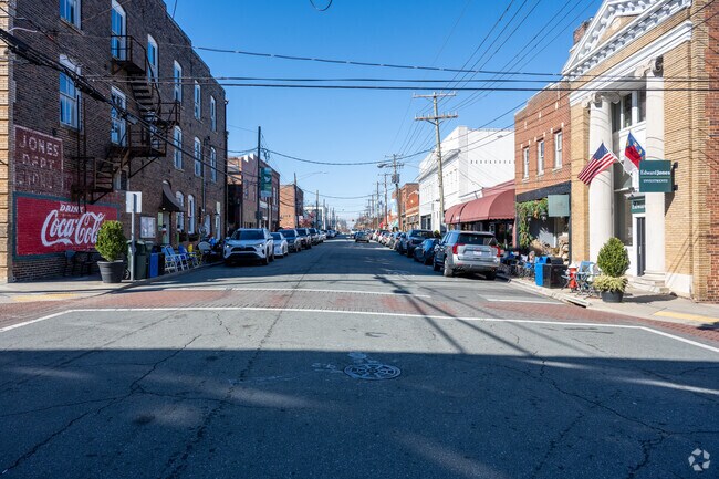 Colorful facades and busy sidewalks make downtown Mebane a vibrant destination.