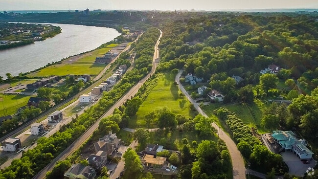 The sun sets over the Ohio River, which runs to the south of Hyde Park.