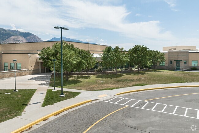 Majestic Elementary School has a row of trees planted at the entrance.