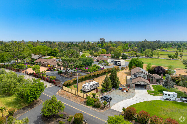 Row of custom homes sit peacefully and spaced out on generously sized lots in Bianchi Estates.