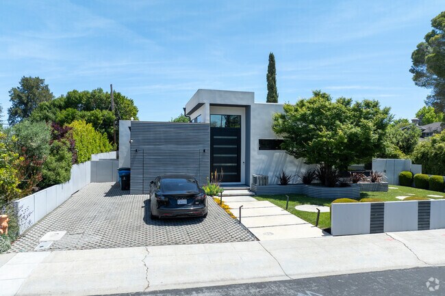 A contemporary home in Fairmeadow with geometric design and a high-contrast color palette.
