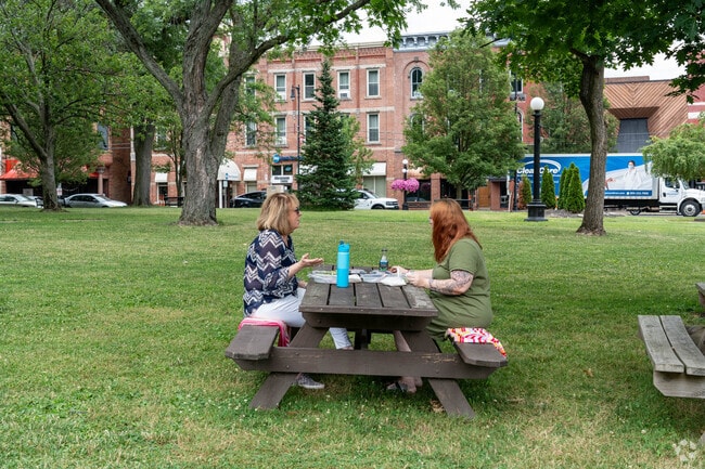 Historic Perkins residents enjoy lunch in Courthouse Square.