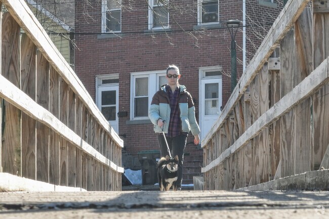Take your furry friend for a walk across the bridge next to Dougherty Veteran's Field.