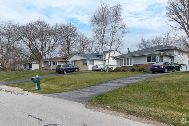A row of split-level homes showcasing the popular style on Jewell Road.
