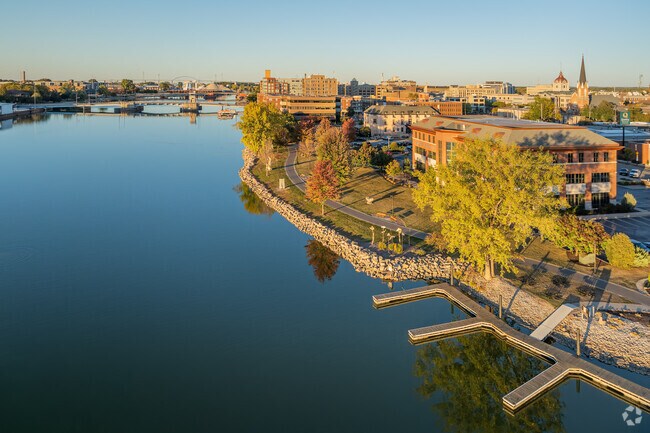Walking along the Fox River at sunset is a favorite activity for Downtown residents.
