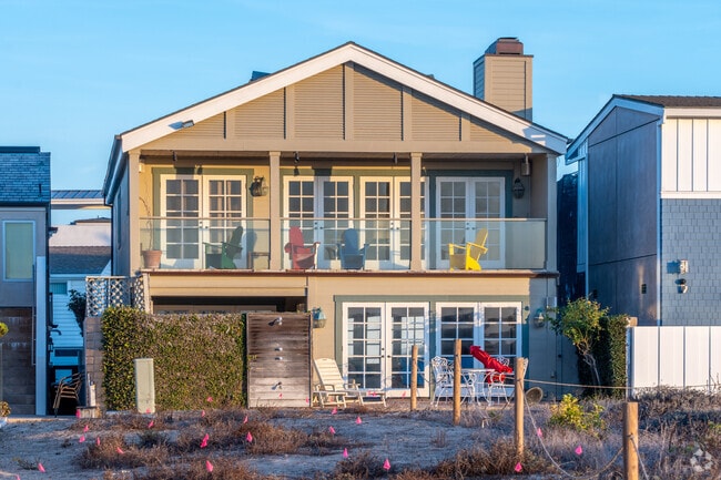 Second story porches allow for panoramic views of Balboa Peninsula Point's sunsets.