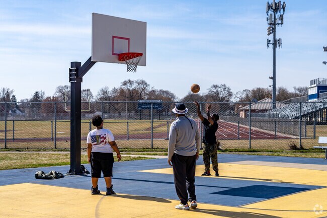 Moross-Morang locals visit nearby Skinner Playfield, which received new basketball courts recently.