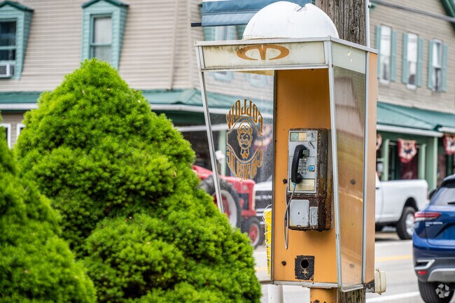 An old time public phone sits in the business section of Scenery Hill.