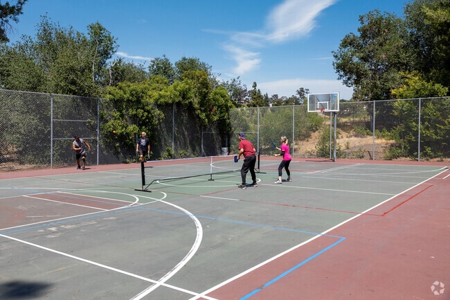 Friends play pickle ball at Carmel Mountain Ranch Community Park near Sabre Springs.