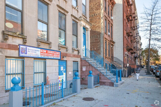 Storefront Academy Harlem sits alongside residences.