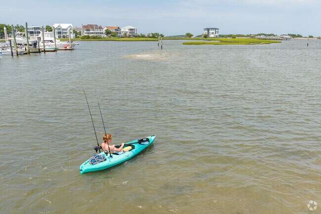 A Woodberry Forest teenager spends the afternoon fishing in the sound.