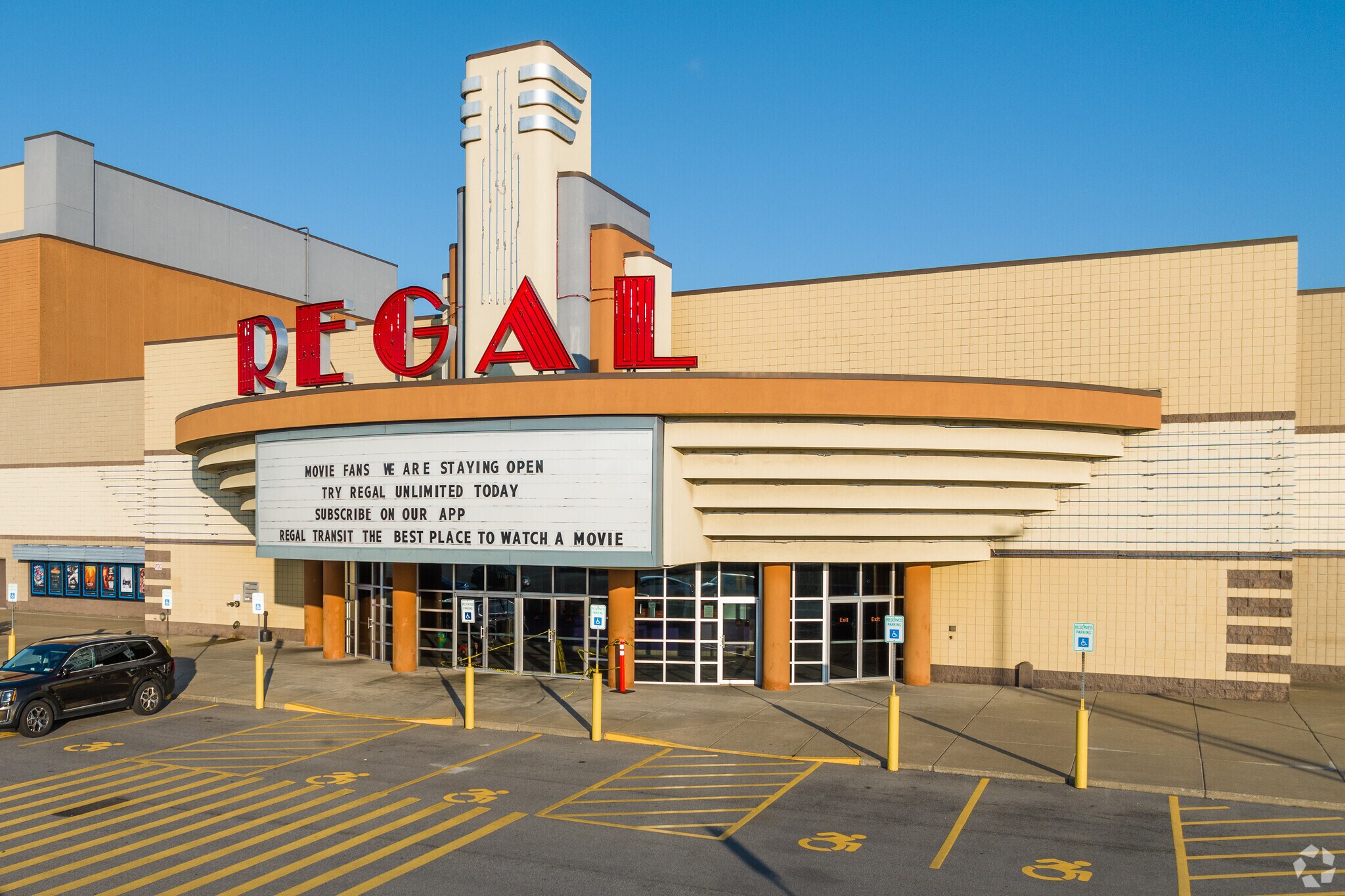 A local Regal movie theater in Harris Hill runs along Transit Road.