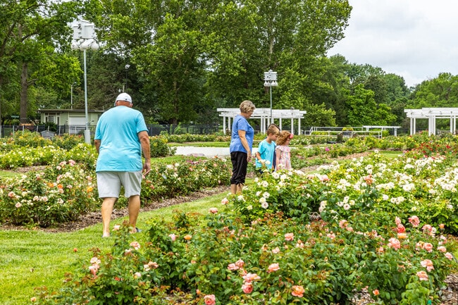 Locals wander through the Reinisch Rose Garden at Gage Park.