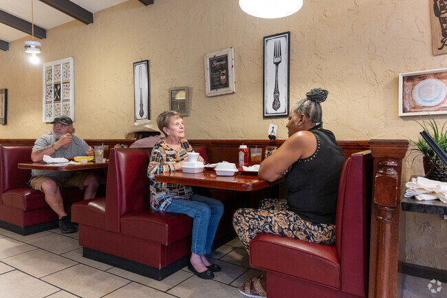 You can meet up with friends to enjoy a meal at North Point Grill, minutes from Forest Hills.