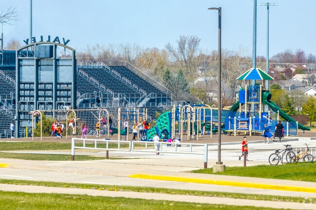 The playground of Jordan Creek Elementary overlooks Valley Stadium.