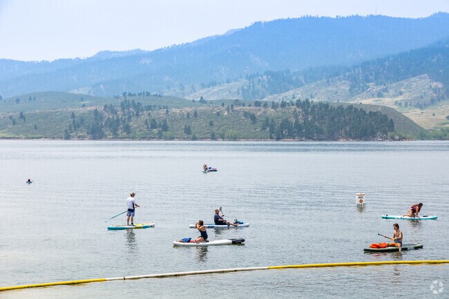 Horsetooth Reservoir draws Brown Farm paddle-boarders to its calm waters.