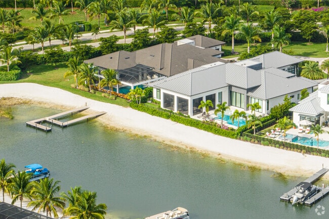 Tranquil Mediterranean, Vibrant Coastal, and Charming Cottage Homes grace Miromar Lakes.