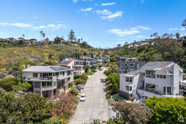 Stunning three-story homes grace the hills of La Jolla, offering panoramic ocean views.