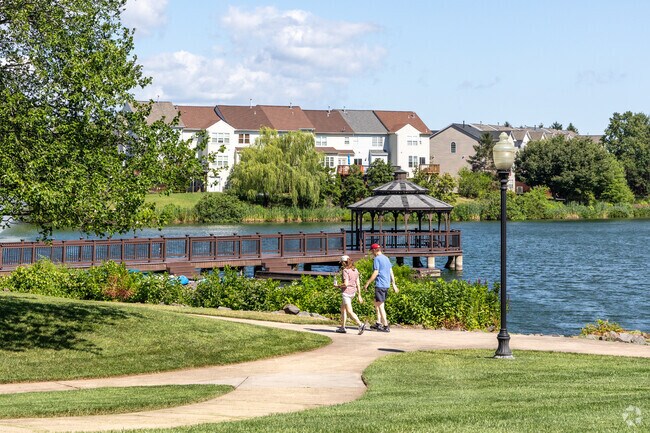 Enjoy a stroll around the lake and take in mother nature at its best in Ashburn Village.