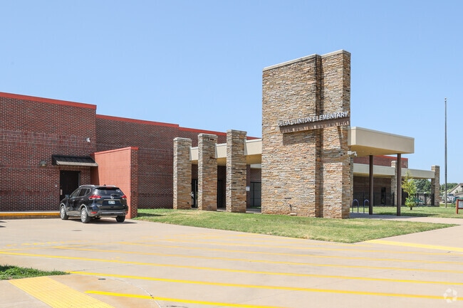 Celia Clinton is located on North Harvard Avenue near Pine Street.