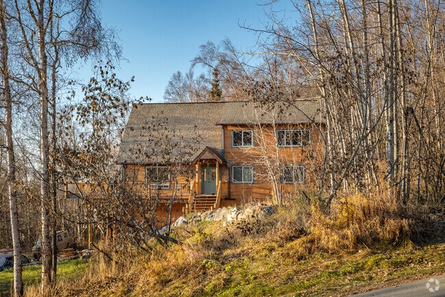 Spacious three-level homes are nestled in the woods and hillsides of Chugiak.